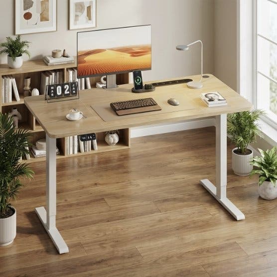 Elektriskt höj- och sänkbart skrivbord 140 × 60 cm